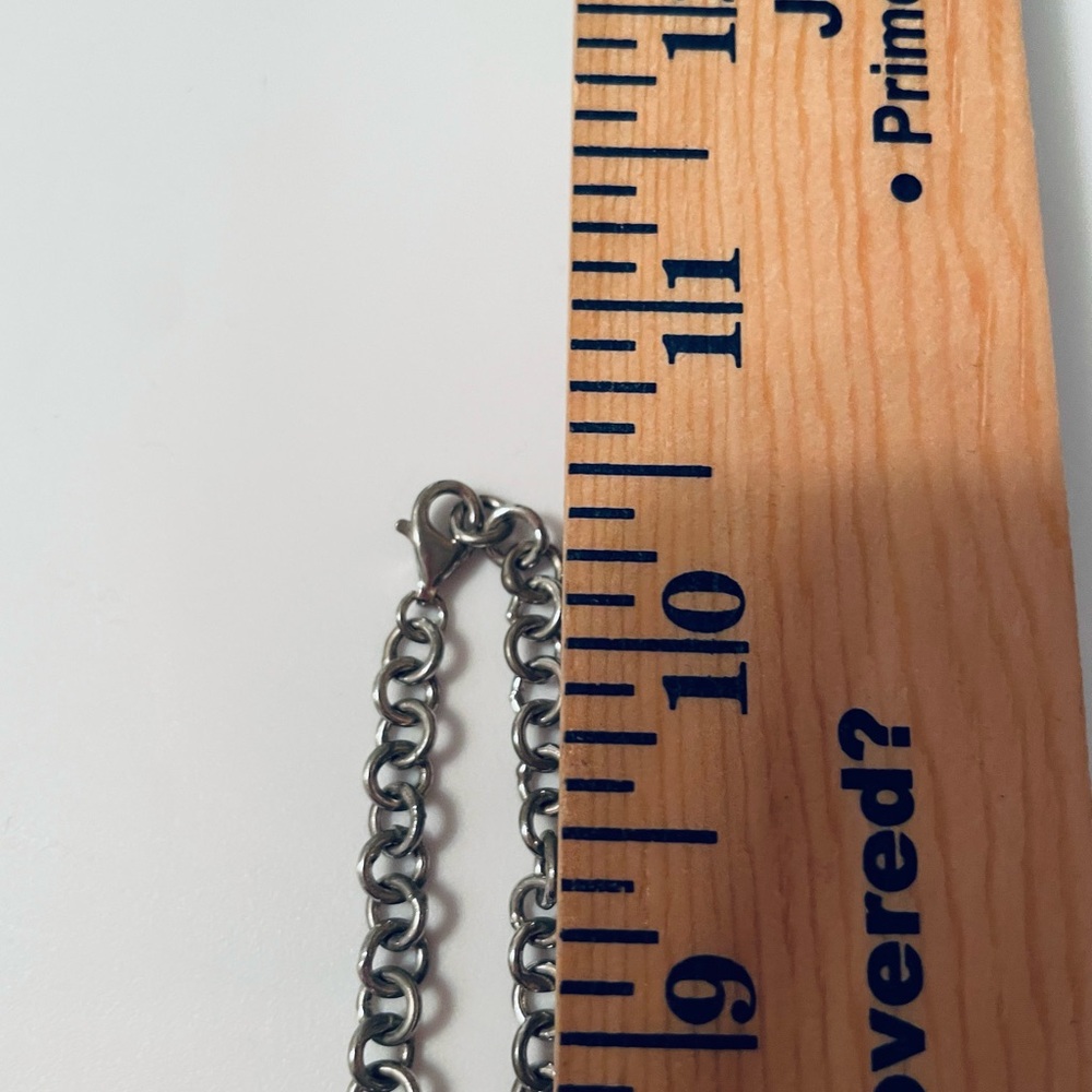 Silver toned heart necklace with crystal beads on the interior of glass chain - Picture 10 of 11
